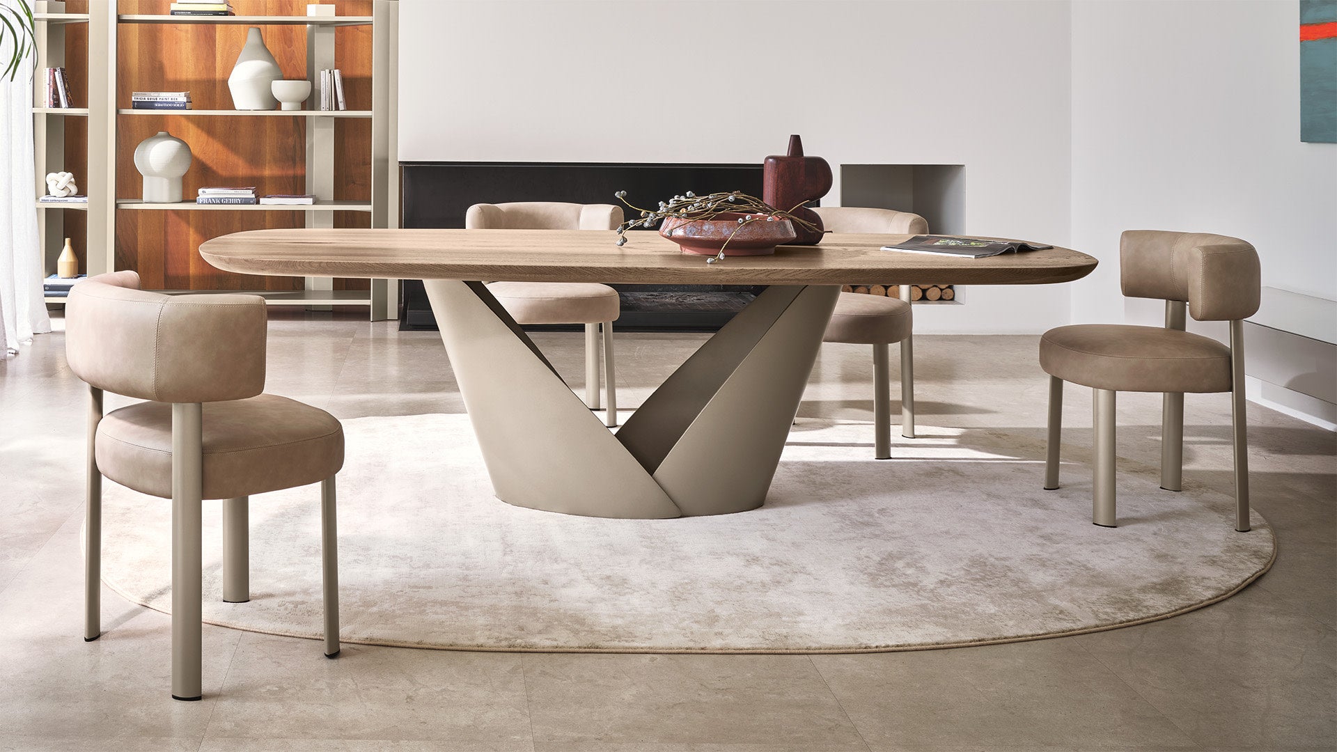 Bean rug by Calligaris under a dining table and chairs, eye-level view