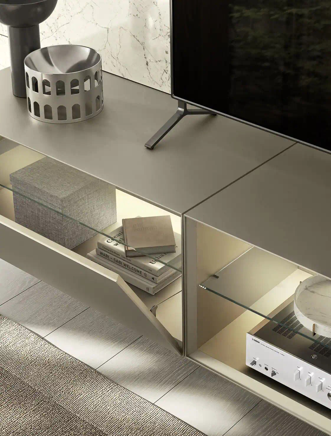 Domino Composition 8536 detail: drop-down front opening onto a lit compartment with a glass shelf