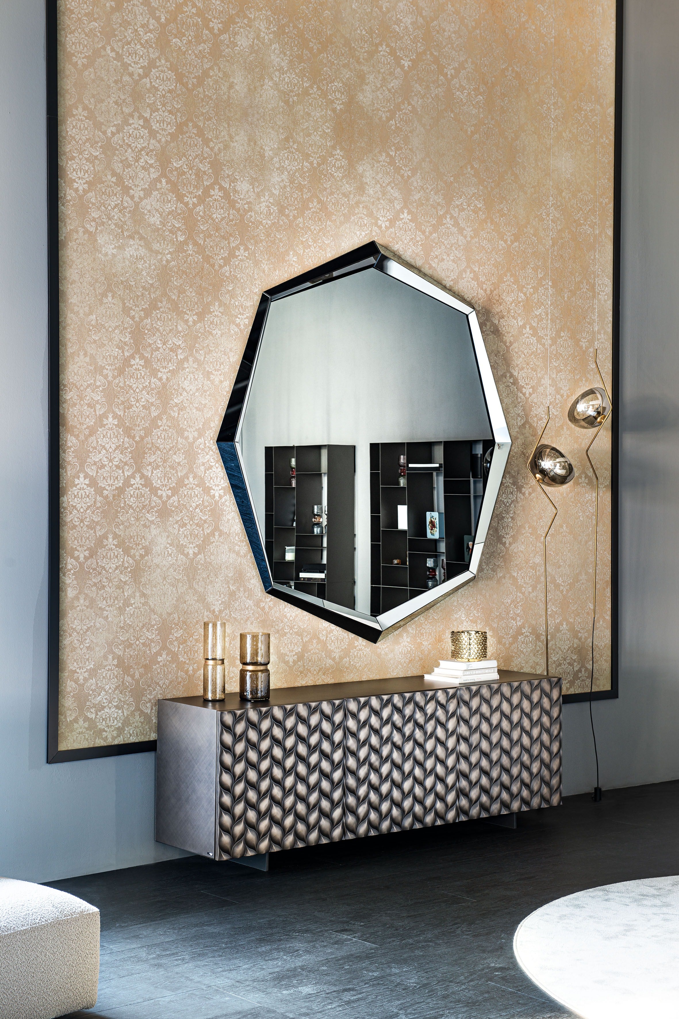 Emerald Magnum mirror: octagonal mirror on a gold damask wallpaper panel above a woven-front sideboard