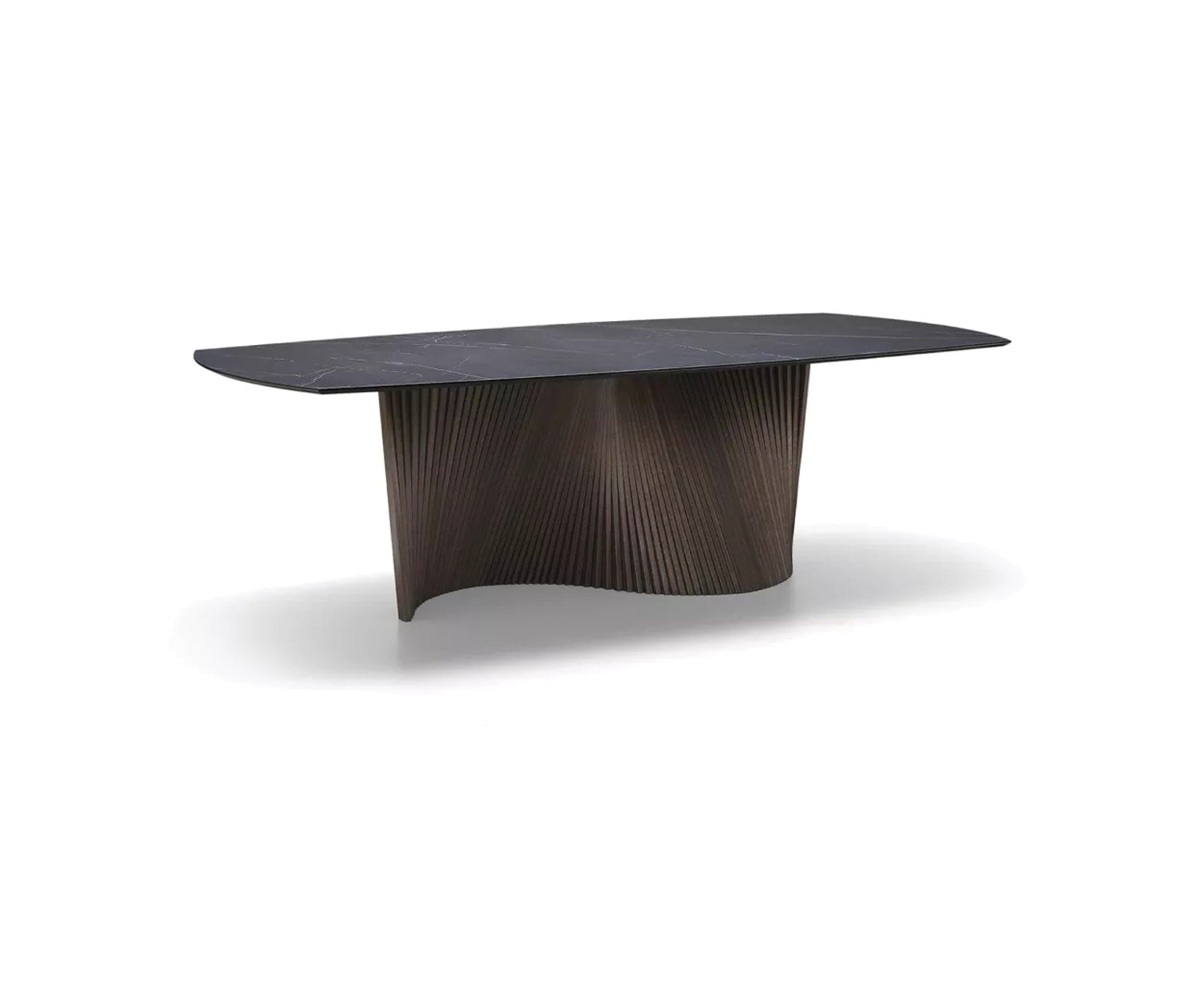 Natisa Orbit dining table with dark marble-effect barrel top and fluted wood pedestal base on white background