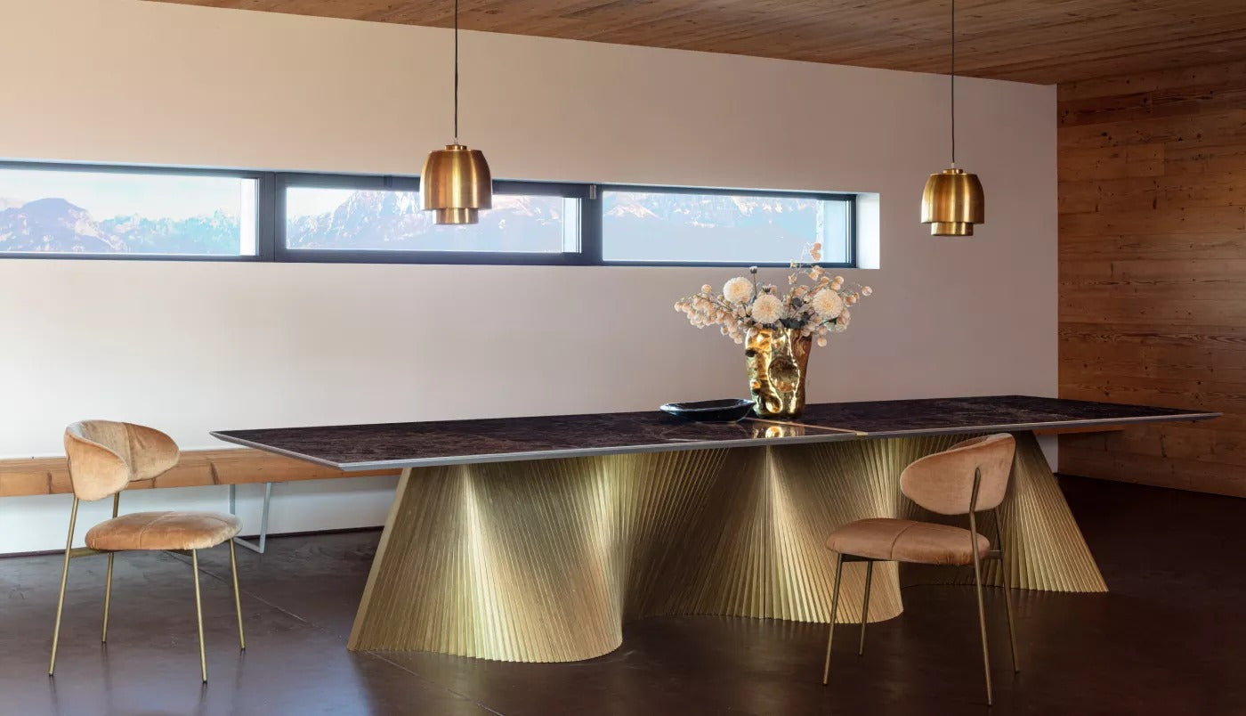 Orbit 400 rectangular dining table with gold base and dark brown marble-look top