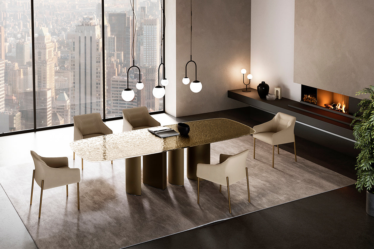 Plai Glass Top dining table with shaped bronze hammered glass top and bronze base